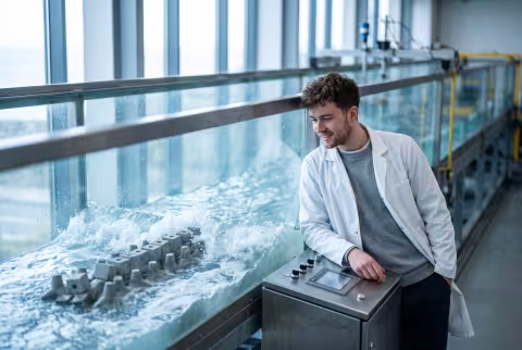 Coastal engineering hero — wave flume laboratory test — Program imagery, coastal engineering cluster.